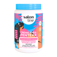 Creme Salon Line 1kg Definição Máxima, pote branco e tampa azul claro. Hidrata e define com brilho e ação antifrizz.