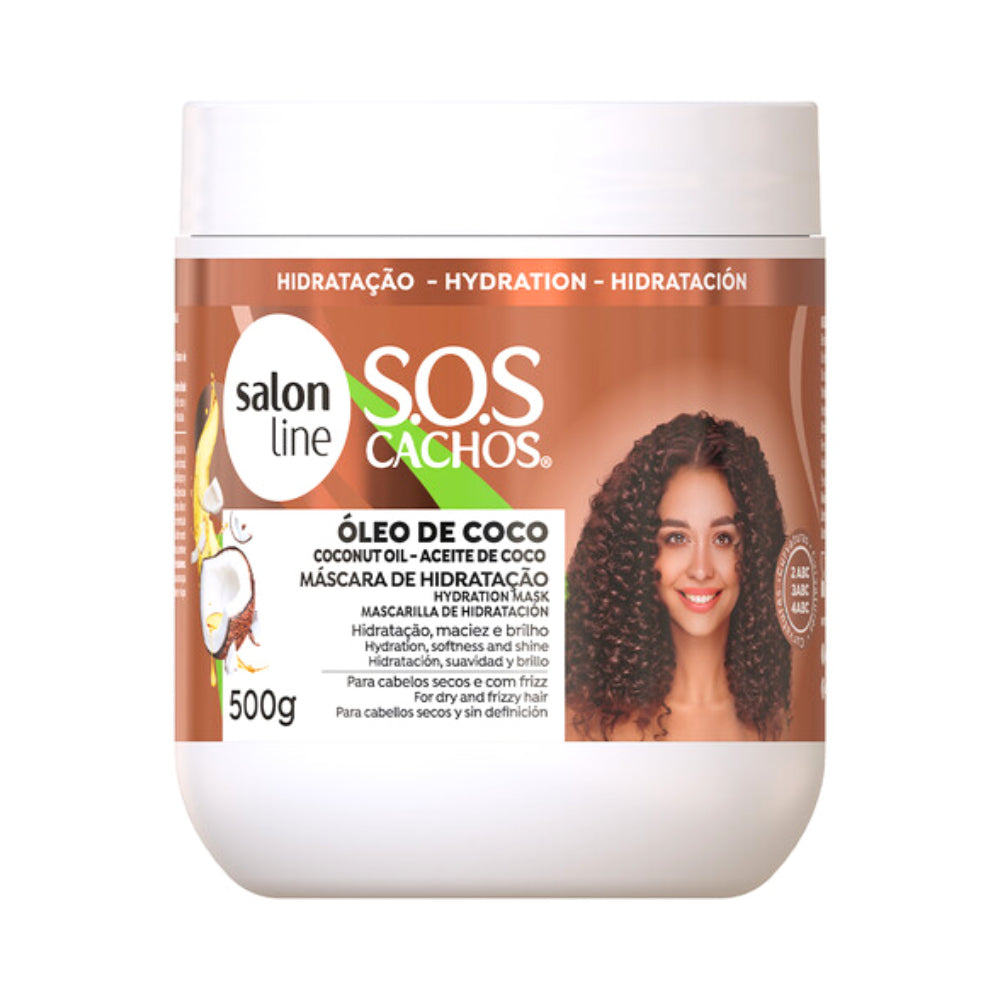 Máscara Salon Line S.O.S Cachos Óleo de Coco 500g, pote e tampa brancos. Com Óleo de Coco, proporciona hidratação, maciez e brilho para cabelos secos e com frizz.